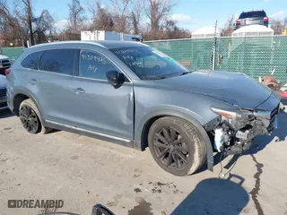 2021 Mazda CX-9 Grand Touring with VIN JM3TCBDY2M0530533, listed as a IAAI auction lot 41309425 with 84,747 mi miles. Bid and sale history available at carsss.com. Image 1.