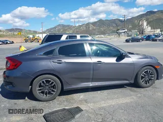 2016 Honda Civic Sedan LX with VIN 19XFC2F51GE034644, listed as a IAAI auction lot 41939884 with 59,433 mi miles. Bid and sale history available at carsss.com. Image 12.