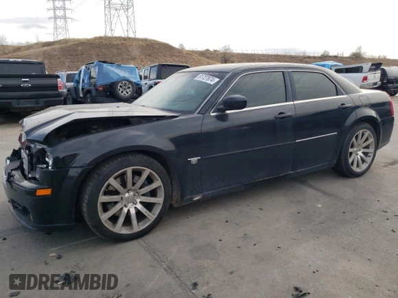 2006 Chrysler 300 C SRT8 with VIN 2C3LA73WX6H421400, listed as a Copart auction lot 48517725 with 168,374 mi miles and Non Repairable. Bid and sale history available at carsss.com. Image 1.