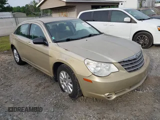 2010 Chrysler Sebring Touring z VIN 1C3CC4FBXAN210425, wystawiony jako IAAI lot #42275197 z przebiegiem 123 200 mil mil oraz . Historia ofert i sprzedaży dostępna na DreamBid. Obrazek 1.