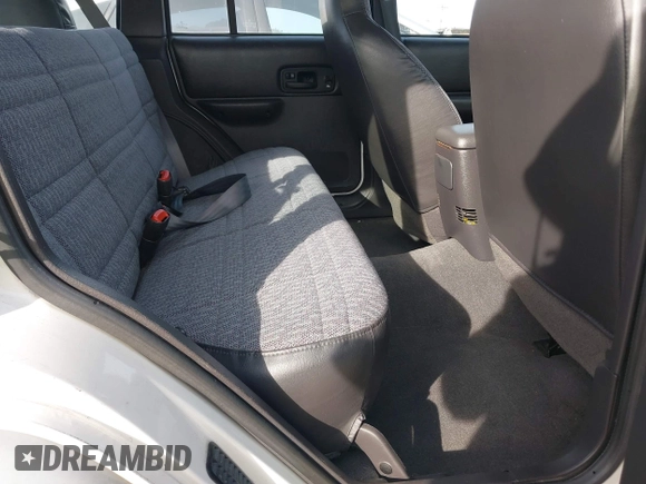 2000 Jeep Cherokee SE with VIN 1J4FF28S4YL162504, listed as a IAAI auction lot 41689558 with 174,476 mi miles. Bid and sale history available at carsss.com. Image 8.