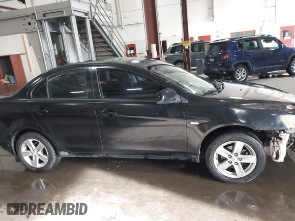 2008 Mitsubishi Lancer DE with VIN JA3AU26UX8U015865, listed as a IAAI auction lot 41108329 with 131,884 mi miles. Bid and sale history available at carsss.com. Image 14.