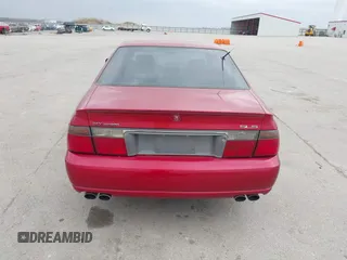 2001 Cadillac Seville z VIN 1G8KS54Y91U227846, wystawiony jako IAAI lot #42134095 z przebiegiem 216 766 mil mil oraz . Historia ofert i sprzedaży dostępna na DreamBid. Obrazek 16.
