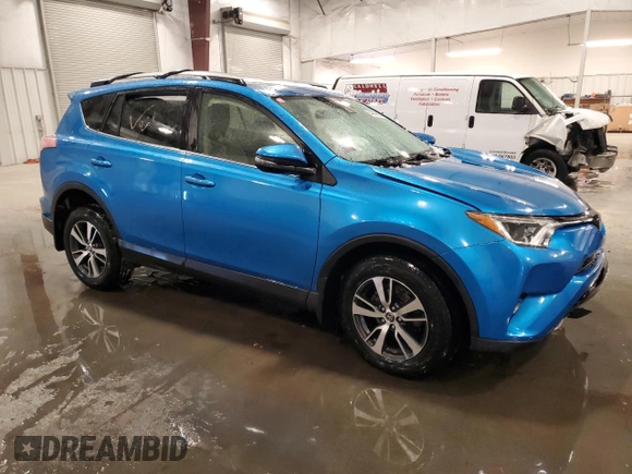 2018 Toyota RAV4 XLE with VIN JTMRFREV3JJ748218, listed as a Copart auction lot 44839665 with 74,791 mi miles and Salvage Title. Bid and sale history available at DreamBid. Image 4.