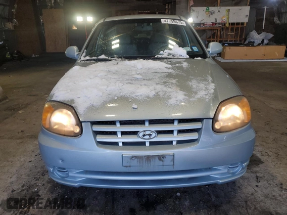 2005 Hyundai Accent GLS with VIN KMHCG45C15U602419, listed as a Copart auction lot 47759675 with 58,133 mi miles and Salvage Title. Bid and sale history available at carsss.com. Image 5.