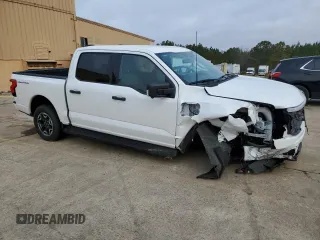 2023 Ford F-150 Lightning Pro z VIN 1FTVW1ELXPWG63466, wystawiony jako Copart lot #43397005 z przebiegiem 8 852 mil mil oraz Szkoda całkowita • Salvage title. Historia ofert i sprzedaży dostępna na DreamBid. Obrazek 4.