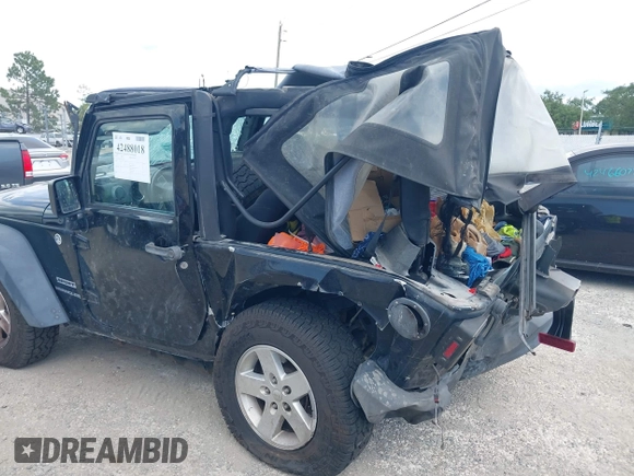 2015 Jeep Wrangler Freedom Edition with VIN 1C4AJWAG4FL681688, listed as a IAAI auction lot 42488018 with Not provided miles and . Bid and sale history available at DreamBid. Image 6.