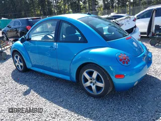 2004 Volkswagen New Beetle Coupe Satellite Blue with VIN 3VWGK31C14M420613, listed as a IAAI auction lot 42046048 with 117,274 mi miles. Bid and sale history available at carsss.com. Image 3.