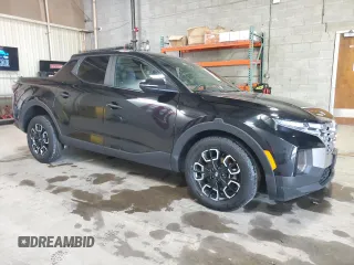 2024 Hyundai Santa Cruz SEL z VIN 5NTJBDAE4RH097401, wystawiony jako Copart lot #55235555 z przebiegiem 31 201 mil mil oraz Czysty tytuł • Clean title. Historia ofert i sprzedaży dostępna na DreamBid. Obrazek 4.