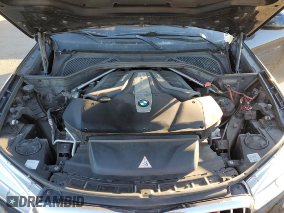 2015 BMW X6 xDrive50i with VIN 5UXKU6C52F0F94480, listed as a Copart auction lot 41539505 with 148,175 mi miles and Salvage Title. Bid and sale history available at carsss.com. Image 12.