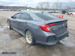 2019 Honda Civic Si Sedan with VIN 2HGFC1E59KH703592, listed as a IAAI auction lot 38735418 with 103,791 mi miles. Bid and sale history available at carsss.com. Image 3.
