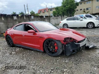 2024 Porsche Taycan GTS with VIN WP0AD2Y11RSA47589, listed as a Copart auction lot 73954444 with 4,452 mi miles and Salvage Title. Bid and sale history available at DreamBid. Image 4.