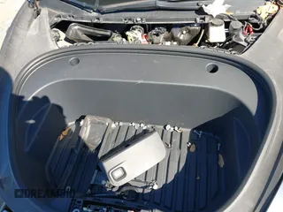 2022 Tesla Model 3 with VIN 5YJ3E1EAXNF326354, listed as a IAAI auction lot 41651872 with 27,922 mi miles and . Bid and sale history available at DreamBid. Image 10.