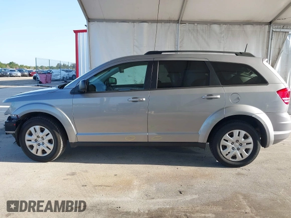 2020 Dodge Journey SE Value with VIN 3C4PDCAB7LT261203, listed as a IAAI auction lot 41963451 with 69,612 mi miles and . Bid and sale history available at carsss.com. Image 15.