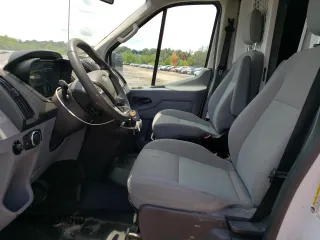 2016 Ford Transit Cargo z VIN 1FTYR2CM5GKB15310, wystawiony jako Copart lot #59266185 z przebiegiem 64 352 mil mil oraz Tytuł czysty. Historia ofert i sprzedaży dostępna na DreamBid. Obrazek 7.