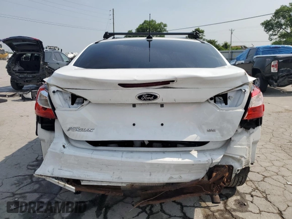 2013 Ford Focus SE with VIN 1FADP3F27DL258565, listed as a Copart auction lot 60662385 with 174,213 mi miles and Salvage title. Bid and sale history available at DreamBid. Image 6.