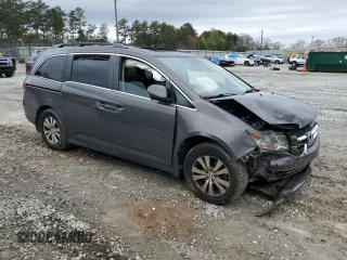 2016 Honda Odyssey EX-L with VIN 5FNRL5H60GB085888, listed as a Copart auction lot 50439075 with 167,129 mi miles and Salvage Title. Bid and sale history available at carsss.com. Image 4.