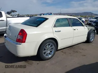 2006 Chrysler 300 C with VIN 2C3KA63H06H534666, listed as a IAAI auction lot 41892603 with 116,431 mi miles. Bid and sale history available at carsss.com. Image 4.