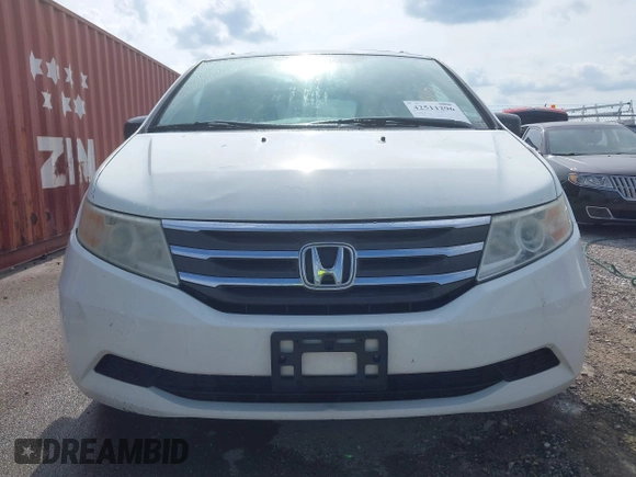 2011 Honda Odyssey EX-L with VIN 5FNRL5H60BB026171, listed as a IAAI auction lot 42511296 with 288,827 mi miles and . Bid and sale history available at DreamBid. Image 12.