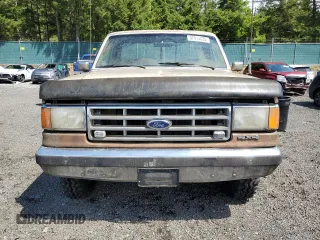 1987 Ford F-150 с VIN 1FTEF14H2HKB06296, выставлен на аукционе Copart как лот 57914035 с пробегом 40 931 миль миль и Чистый • Clean title. История ставок и продаж доступна на DreamBid. Изображение 5.