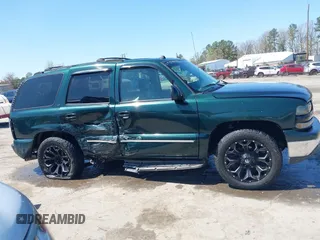 2004 Chevrolet Tahoe LS with VIN 1GNEK13Z74J182853, listed as a IAAI auction lot 41919117 with 141,188 mi miles. Bid and sale history available at carsss.com. Image 13.