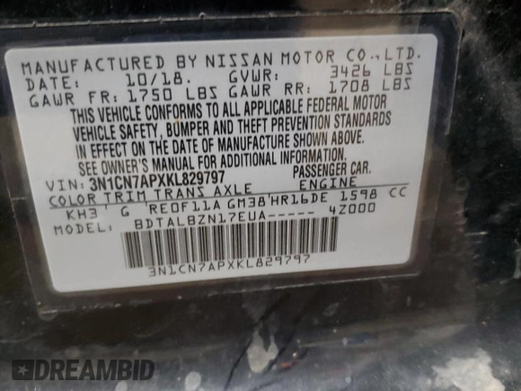 2019 Nissan Versa SV z VIN 3N1CN7APXKL829797, wystawiony jako Copart lot #59016235 z przebiegiem 90 811 mil mil oraz Szkoda całkowita • Salvage title. Historia ofert i sprzedaży dostępna na DreamBid. Obrazek 13.