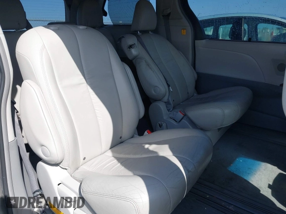 2011 Toyota Sienna XLE AAS with VIN 5TDYK3DC8BS156127, listed as a IAAI auction lot 42103980 with 129,851 mi miles. Bid and sale history available at carsss.com. Image 8.