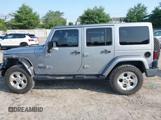 2015 Jeep Wrangler Unlimited Sahara with VIN 1C4BJWEG9FL570780, listed as a IAAI auction lot 42474940 with 116,226 mi miles and . Bid and sale history available at DreamBid. Image 15.