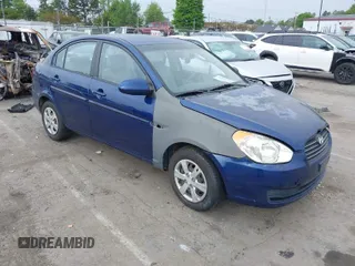 2009 Hyundai Accent Auto GLS with VIN KMHCN46C69U313921, listed as a IAAI auction lot 42011166 with 123,026 mi miles. Bid and sale history available at carsss.com. Image 1.