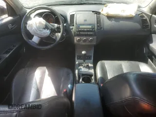 2005 Nissan Altima SE z VIN 1N4BL11D85C209229, wystawiony jako Copart lot #52391285 z przebiegiem 164 231 mil mil oraz Szkoda całkowita • Salvage title. Historia ofert i sprzedaży dostępna na DreamBid. Obrazek 8.