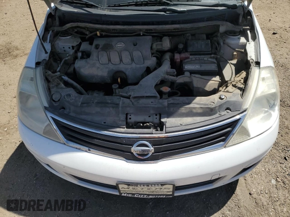 2010 Nissan Versa S z VIN 3N1BC1CP3AL369134, wystawiony jako Copart lot #54437395 z przebiegiem 236 643 mil mil oraz Szkoda całkowita • Salvage title. Historia ofert i sprzedaży dostępna na DreamBid. Obrazek 11.