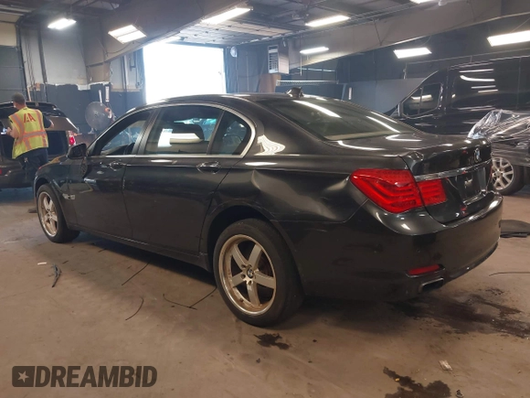 2011 BMW 7 Series 750Li xDrive with VIN WBAKC8C56BC433083, listed as a IAAI auction lot 42523890 with 120,977 mi miles and . Bid and sale history available at DreamBid. Image 3.