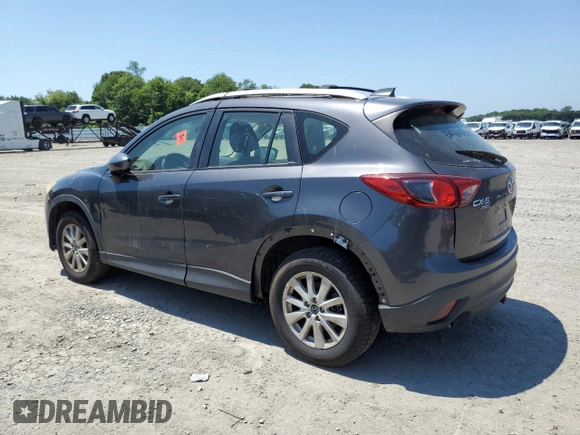 2014 Mazda CX-5 Sport with VIN JM3KE4BE6E0350595, listed as a Copart auction lot 61826475 with Not provided miles and Clean title. Bid and sale history available at DreamBid. Image 2.