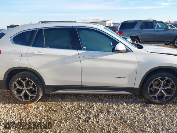 2018 BMW X1 sDrive28i with VIN WBXHU7C36J5H41267, listed as a IAAI auction lot 41270207 with 84,726 mi miles. Bid and sale history available at carsss.com. Image 13.