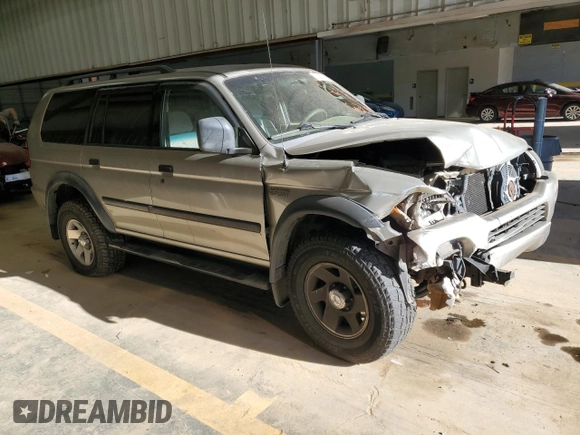 2002 Mitsubishi Montero ES z VIN JA4LS21H32J058330, wystawiony jako Copart lot #83523844 z przebiegiem 186 781 mil mil oraz Szkoda całkowita • Salvage title. Historia ofert i sprzedaży dostępna na DreamBid. Obrazek 4.
