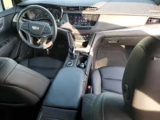 2022 Cadillac XT5 FWD Luxury z VIN 1GYKNAR49NZ118633, wystawiony jako Copart lot #43274175 z przebiegiem 46 946 mil mil oraz Szkoda całkowita • Salvage title. Historia ofert i sprzedaży dostępna na DreamBid. Obrazek 8.