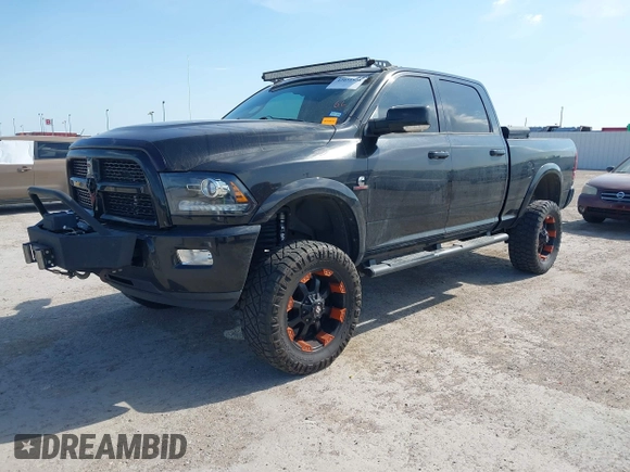 2015 Ram 2500 Laramie with VIN 3C6UR5FL2FG614985, listed as a IAAI auction lot 42031528 with 248,421 mi miles and . Bid and sale history available at DreamBid. Image 2.