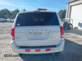 2019 Dodge Grand Caravan SE with VIN 2C7WDGBG7KR803126, listed as a IAAI auction lot 40835937 with 63,100 mi miles and . Bid and sale history available at DreamBid. Image 17.