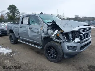 2022 Ram 2500 Laramie with VIN 3C6UR5FL8NG283134, listed as a IAAI auction lot 41300612 with 67,307 mi miles. Bid and sale history available at carsss.com. Image 1.