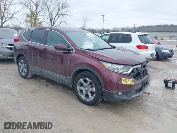 2018 Honda CR-V EX-L z VIN 2HKRW2H87JH698848, wystawiony jako IAAI lot #41624159 z przebiegiem 62 198 mil mil oraz . Historia ofert i sprzedaży dostępna na DreamBid. Obrazek 1.