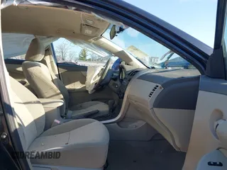 2009 Toyota Corolla with VIN JTDBL40E499035734, listed as a IAAI auction lot 41887480 with 46,511 mi miles. Bid and sale history available at carsss.com. Image 5.