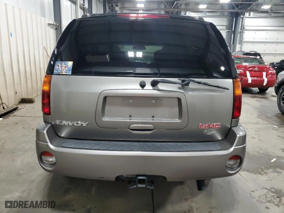 2005 GMC Envoy SLE with VIN 1GKDS13S252229262, listed as a Copart auction lot 51214685 with 117,256 mi miles and Salvage Title. Bid and sale history available at carsss.com. Image 6.