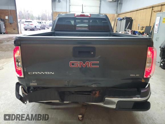 2016 GMC Canyon 4WD SLE with VIN 1GTH6CE36G1160409, listed as a Copart auction lot 80590674 with 58,114 mi miles and Clean Title. Bid and sale history available at carsss.com. Image 6.