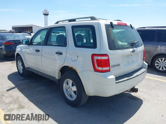 2009 Ford Escape XLS with VIN 1FMCU02759KD02022, listed as a IAAI auction lot 42228347 with 258,533 mi miles and . Bid and sale history available at DreamBid. Image 3.