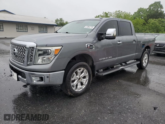 2016 Nissan Titan SL with VIN 1N6BA1F48GN511567, listed as a Copart auction lot 57864775 with 141,545 mi miles and Salvage title. Bid and sale history available at DreamBid. Image 1.