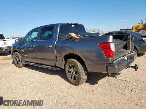 2021 Nissan Titan Pro-4X with VIN 1N6AA1ED9MN521808, listed as a Copart auction lot 58806585 with 108,808 mi miles and Salvage title. Bid and sale history available at DreamBid. Image 2.