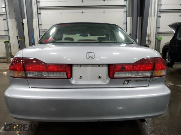2001 Honda Accord LX z VIN JHMCG55401C011175, wystawiony jako Copart lot #88027405 z przebiegiem 143 973 mil mil oraz Szkoda całkowita • Salvage title. Historia ofert i sprzedaży dostępna na DreamBid. Obrazek 6.