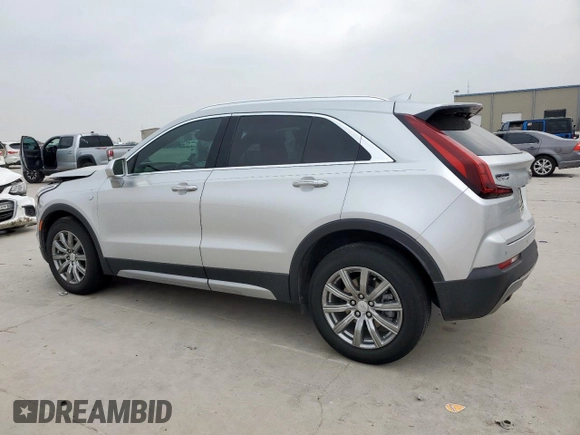 2020 Cadillac XT4 FWD Premium Luxury z VIN 1GYFZCR42LF115413, wystawiony jako Copart lot #56746785 z przebiegiem 41 296 mil mil oraz Szkody całkowita. Historia ofert i sprzedaży dostępna na DreamBid. Obrazek 2.