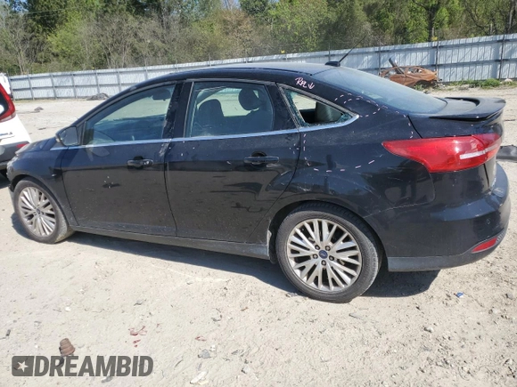 2017 Ford Focus Titanium with VIN 1FADP3J21HL260065, listed as a Copart auction lot 53165945 with 110,540 mi miles and Salvage title. Bid and sale history available at DreamBid. Image 2.