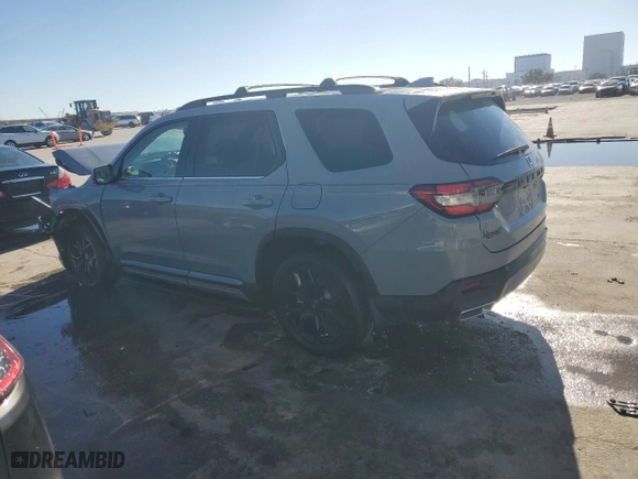 2025 Honda Pilot Touring with VIN 5FNYG2H76SB008958, listed as a Copart auction lot 84707044 with 4,318 mi miles and Salvage Title. Bid and sale history available at carsss.com. Image 2.